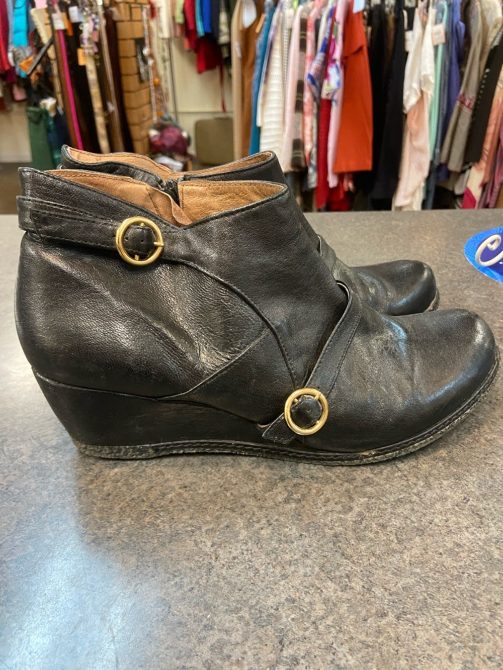 Eric Michael Black Leather Wedge Ankle Booties with Gold Buckles